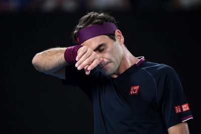 Roger Federer contra Novak Djokovic no Aberto da Austrlia. em janeiro  Foto: Hannah Peters / Getty Images